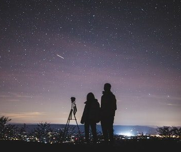silhouette-of-two-person-standing-during-nighttime-1567069